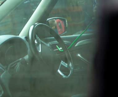 A locksmith unlocking a car