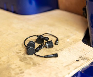 Parking sensor parts on a table