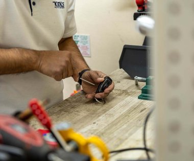 A car key being programmed