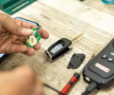 A car key being fixed