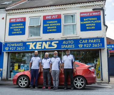 Team members at Ken's autos