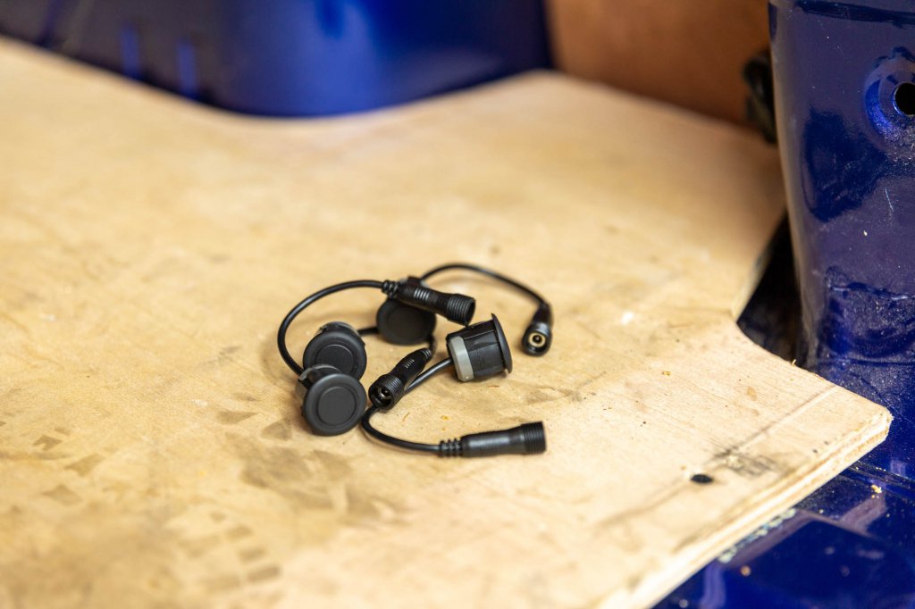 A Bluetooth hands-free kit and microphone ready to be fitted at Ken’s Auto Spares
