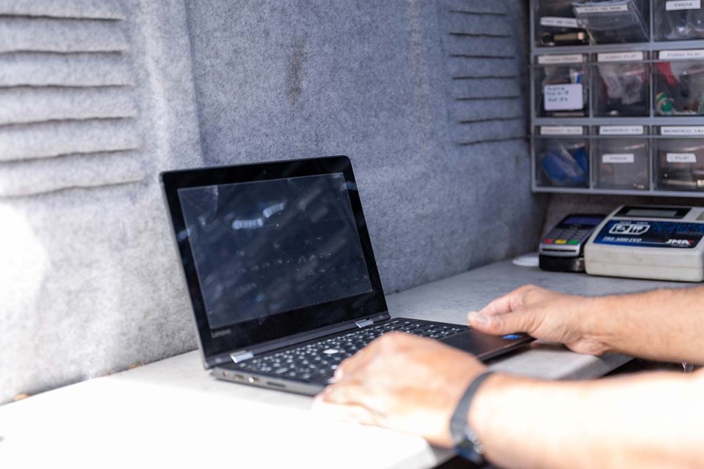 A person typing on a laptop