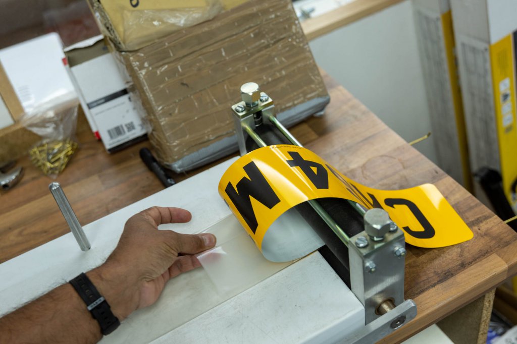 A number plate being created