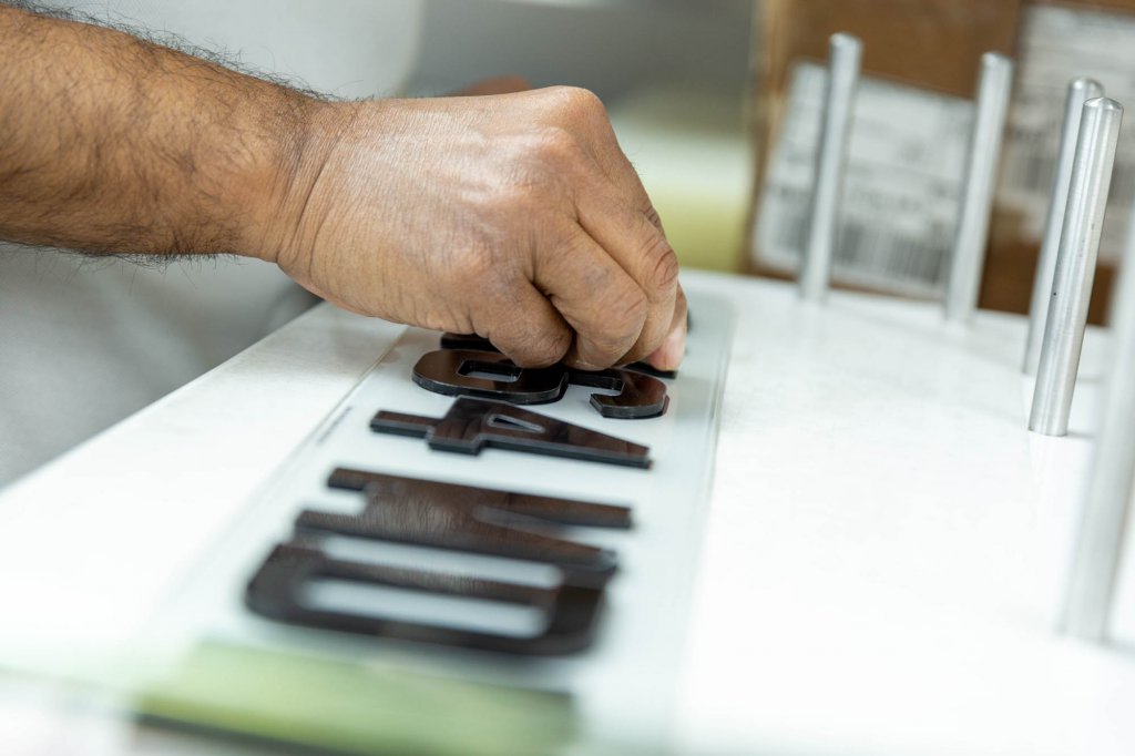 A number plate being created