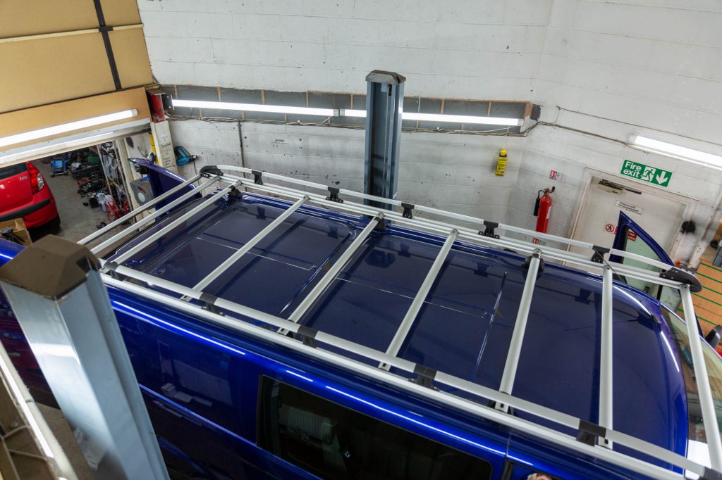 A full-length Rhino roof rack fitted to a van